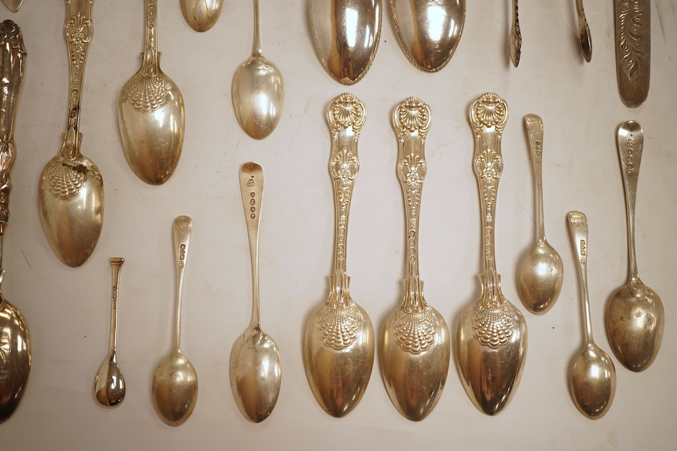 A small quantity of assorted mainly 19th century and later small flatware including teaspoons, coffee spoons and condiment spoons, various dates and makers, a Dutch? white metal spoon and a Victorian silver christening t